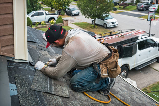 Professional Roofing technician working in Canton, IL